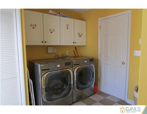 60 Club House Road Brick, NJ 08723 - Photo 7 of 23 a utility room with dryer and washer