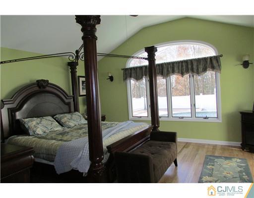 60 Club House Road Brick, NJ 08723 - Photo 9 of 23 a living room with furniture and a window