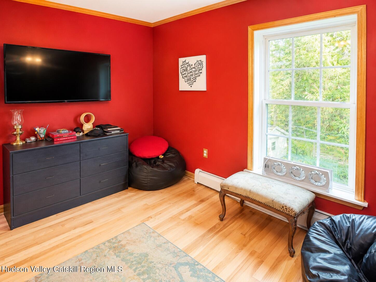 14 Park Road Chichester, NY 12416 - Photo 14 of 20 a bedroom with a bed and a flat screen tv