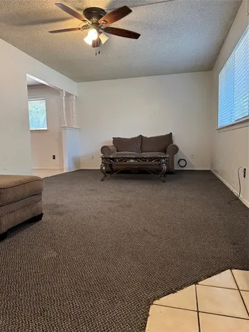 a view of a livingroom with furniture