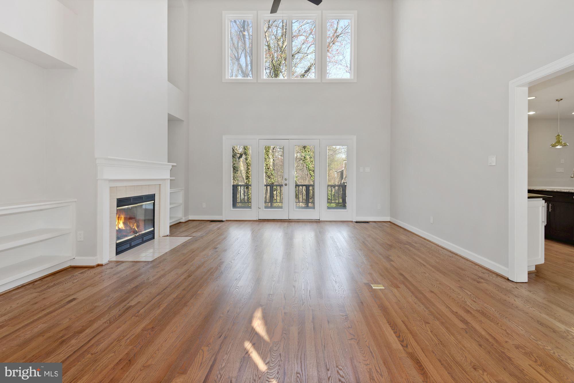 1308 Stamford Way Reston, VA 20194 - Photo 13 of 53 Living Room Floor to Ceiling Windows