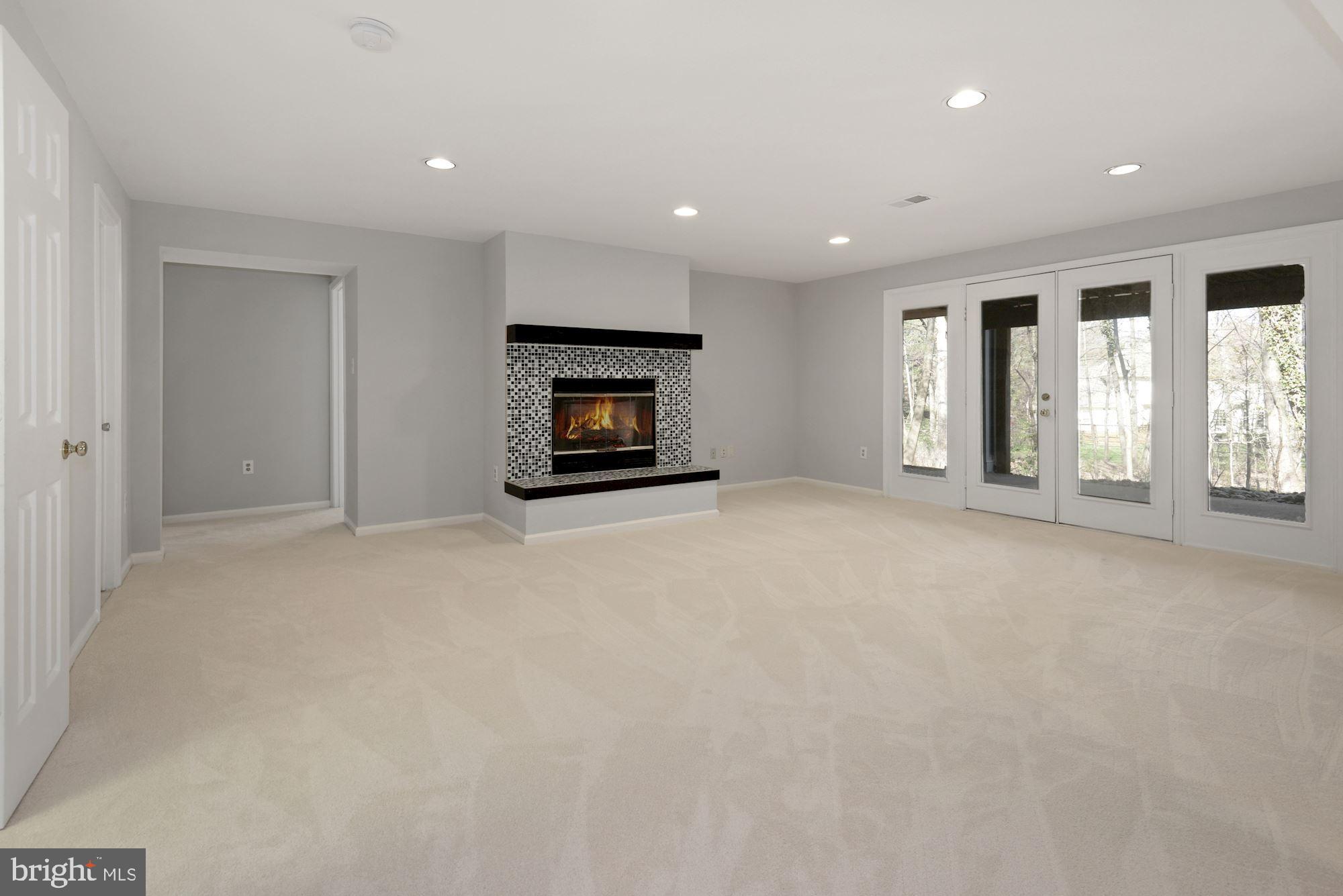 1308 Stamford Way Reston, VA 20194 - Photo 32 of 53 Lower Level Fireplace