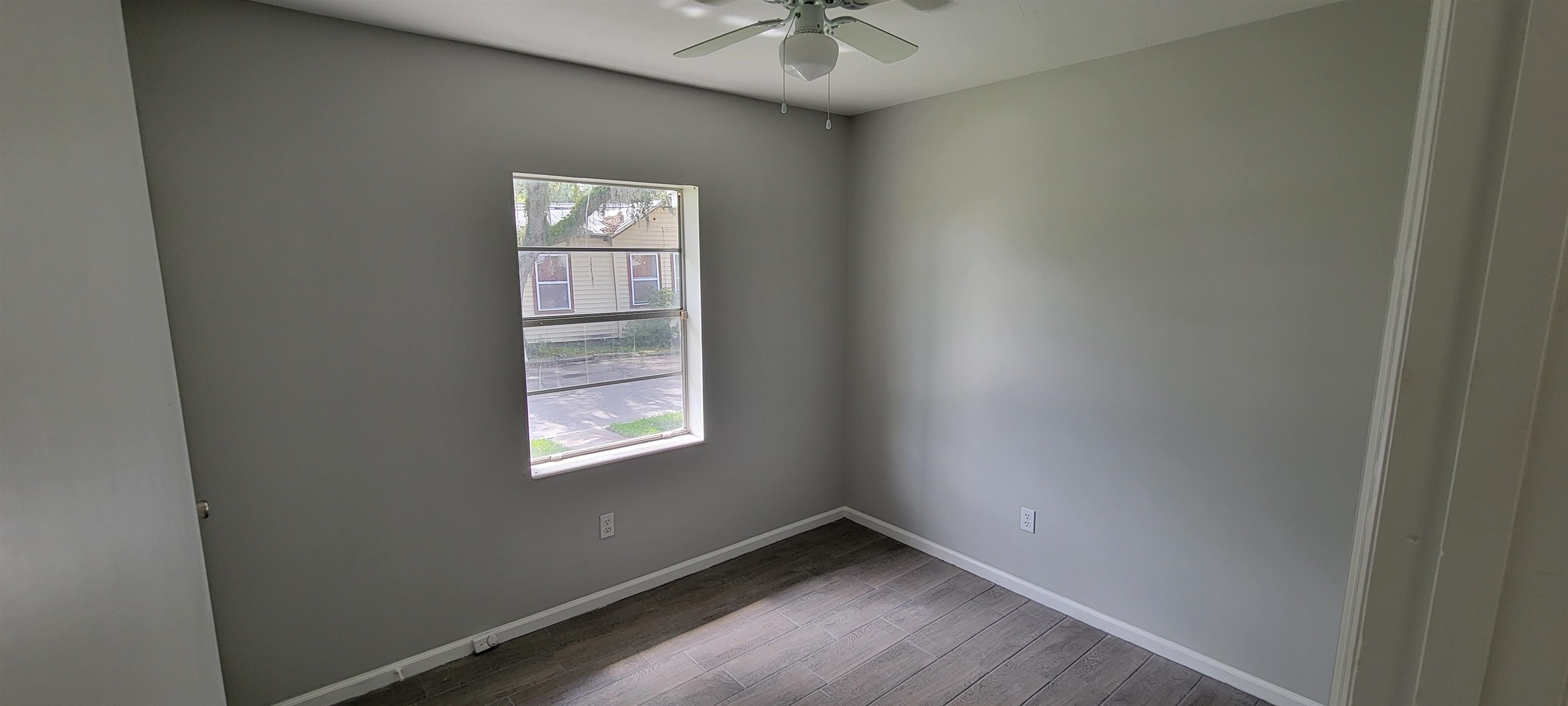 3 Travis Lane St. Augustine, FL 32084 - Photo 11 of 22 an empty room with windows and fan