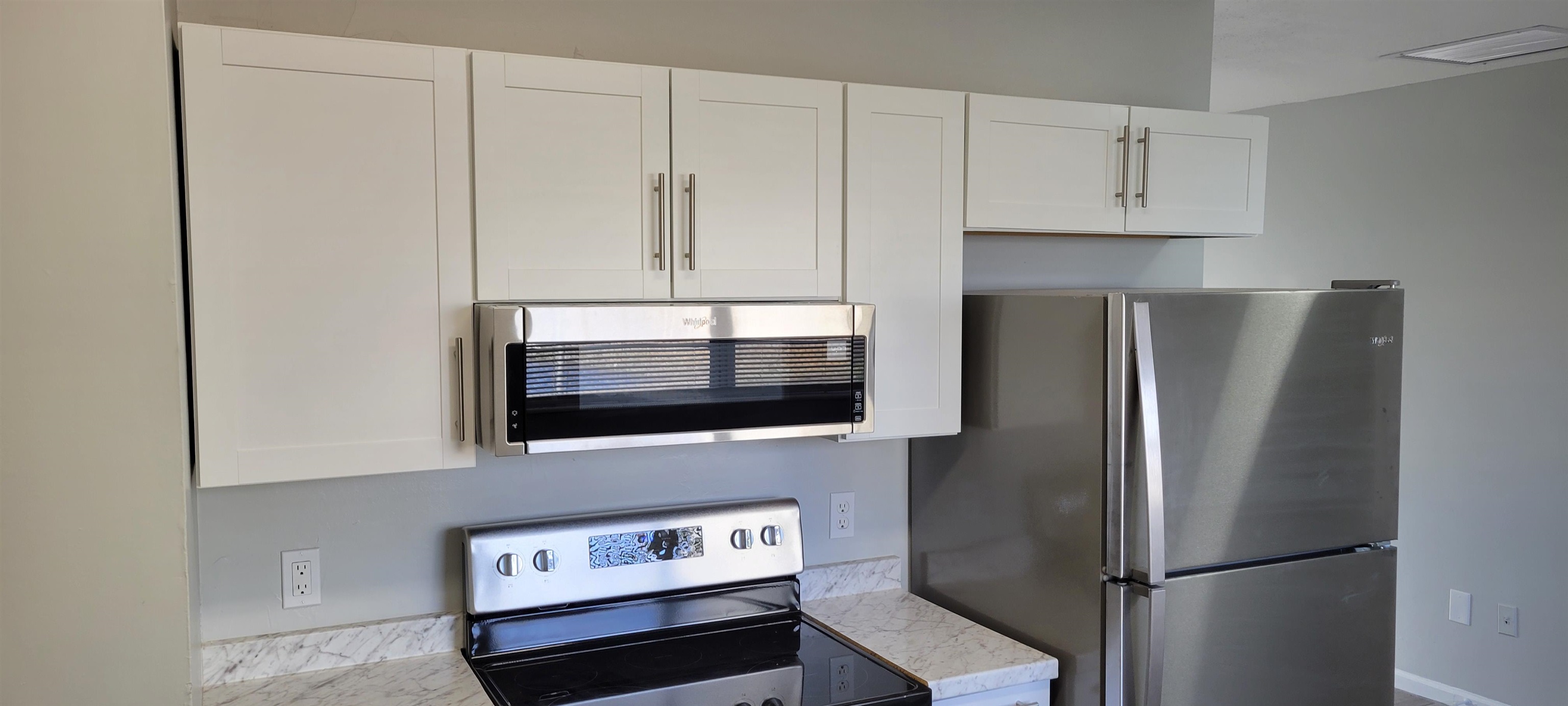 3 Travis Lane St. Augustine, FL 32084 - Photo 20 of 22 a kitchen with stainless steel appliances a refrigerator a stove and cabinets