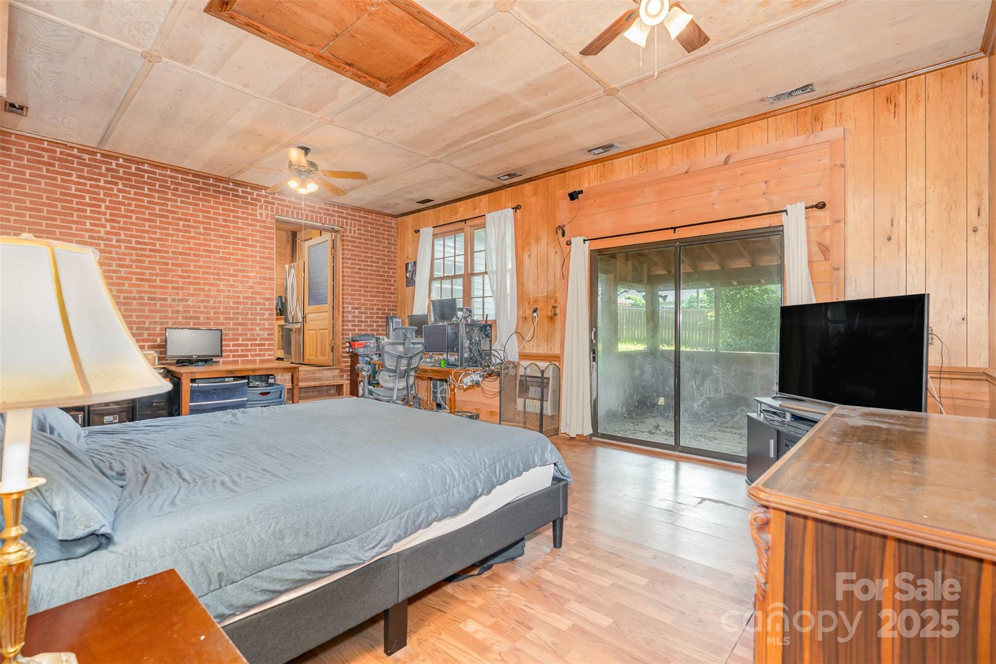 417 Phifer Road Kings Mountain, NC 28086 - Photo 15 of 31 a bedroom with furniture and a flat screen tv
