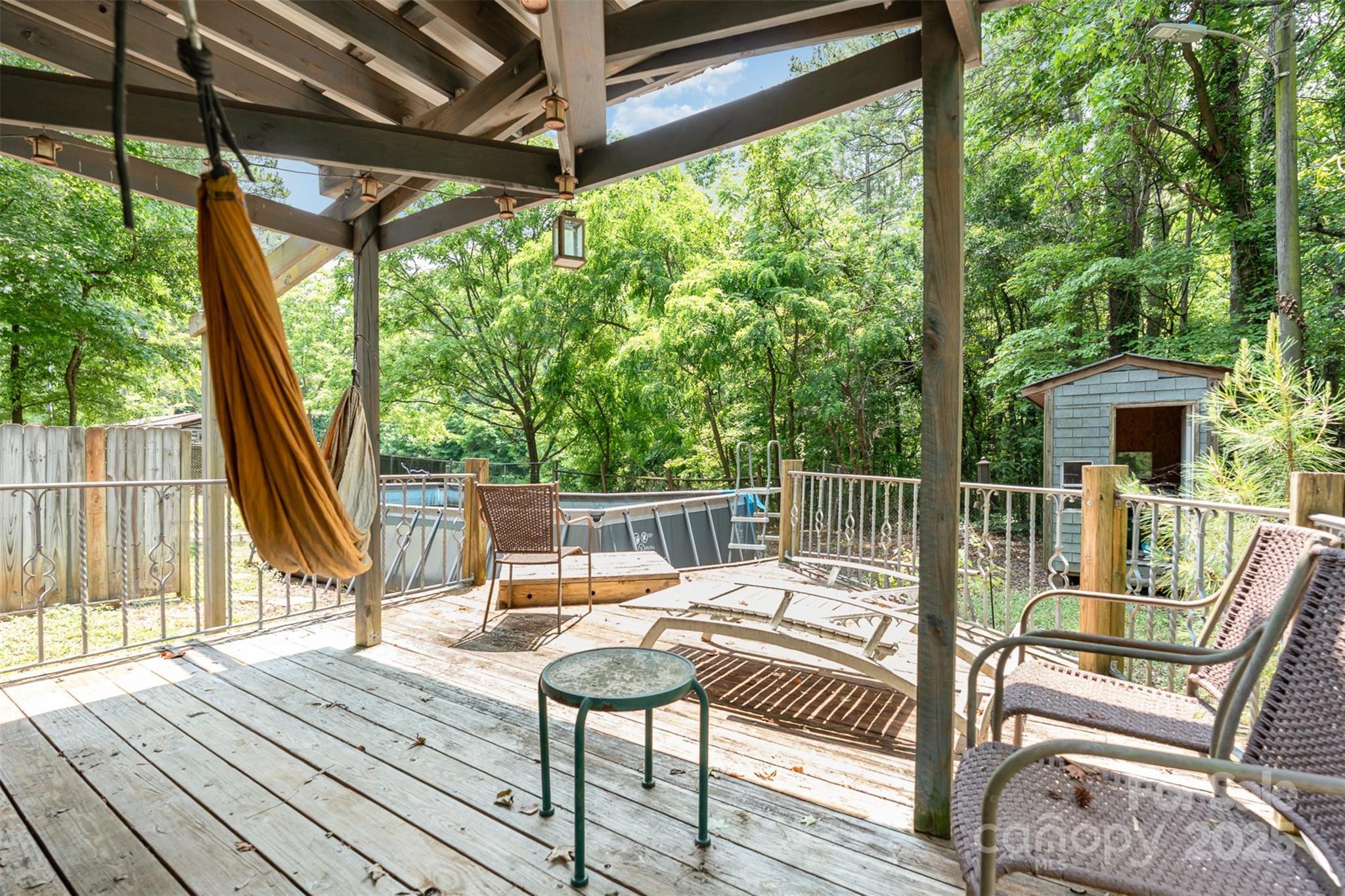 417 Phifer Road Kings Mountain, NC 28086 - Photo 25 of 31 a view of balcony with wooden floor and outdoor seating