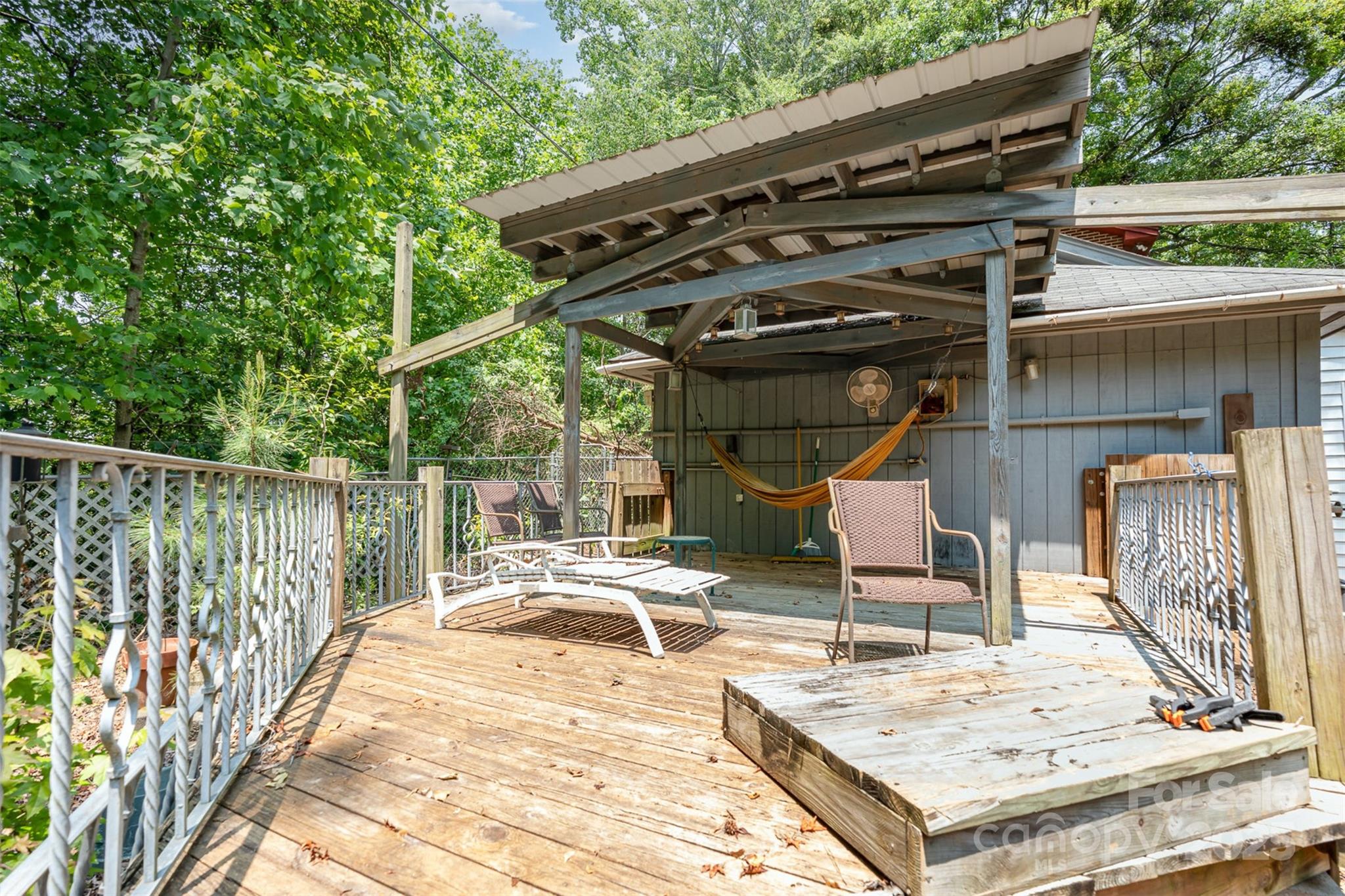 417 Phifer Road Kings Mountain, NC 28086 - Photo 26 of 31 a view of a chair and tables in the patio