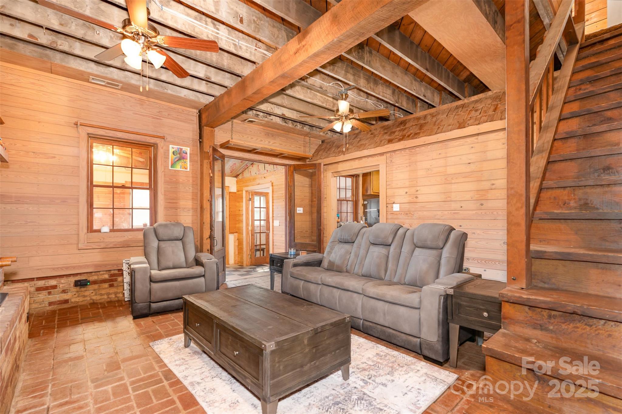 417 Phifer Road Kings Mountain, NC 28086 - Photo 4 of 31 a living room with furniture and a chandelier