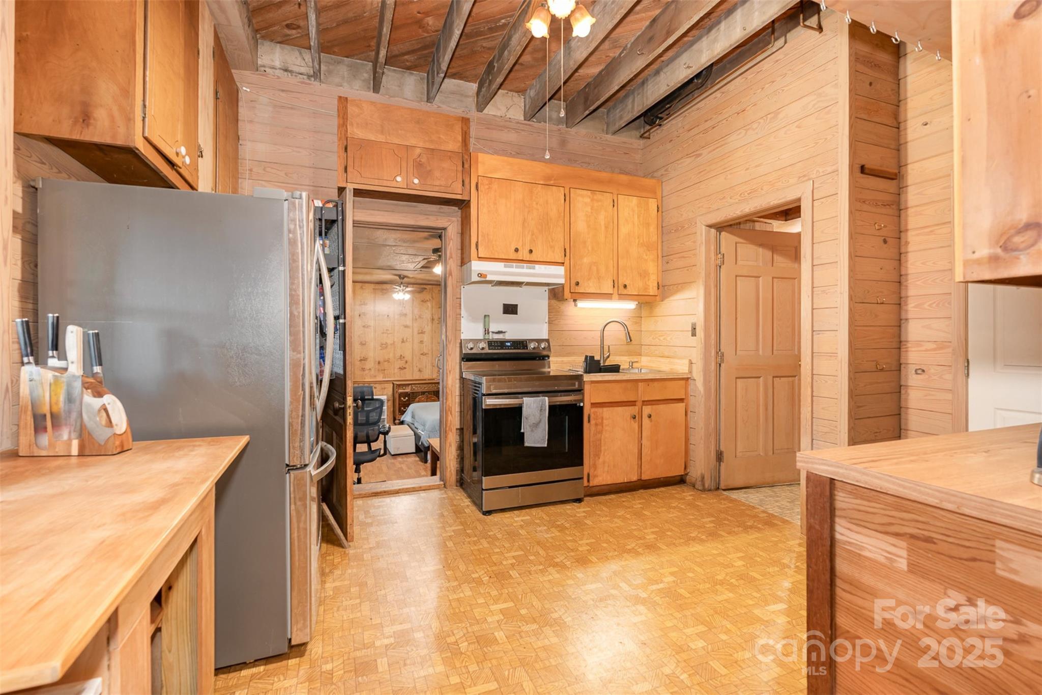 417 Phifer Road Kings Mountain, NC 28086 - Photo 9 of 31 a kitchen with a refrigerator and a stove