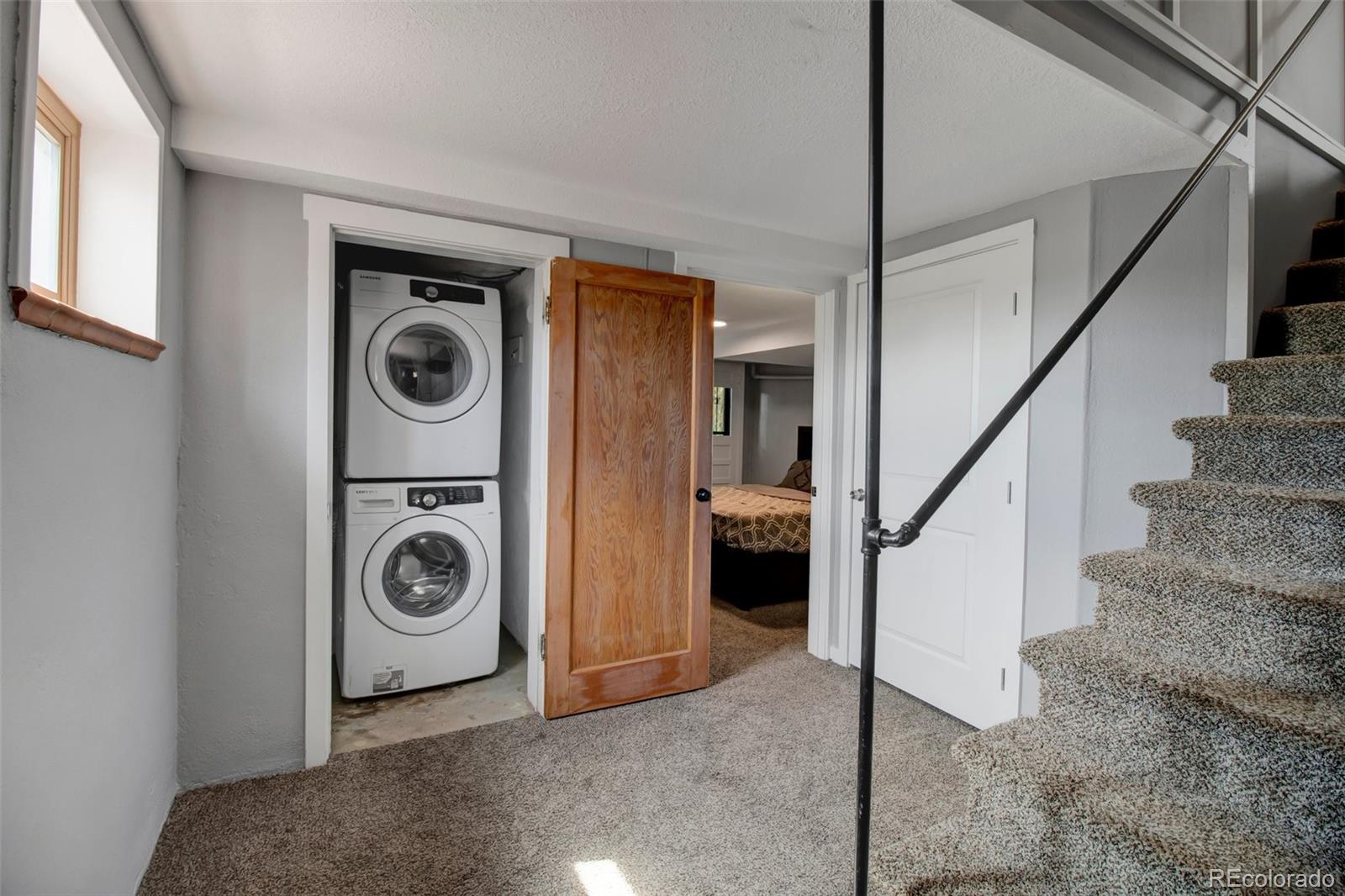 4737 Lowell Boulevard Denver, CO 80211 - Photo 15 of 28 a view of a storage & utility room with washer and dryer