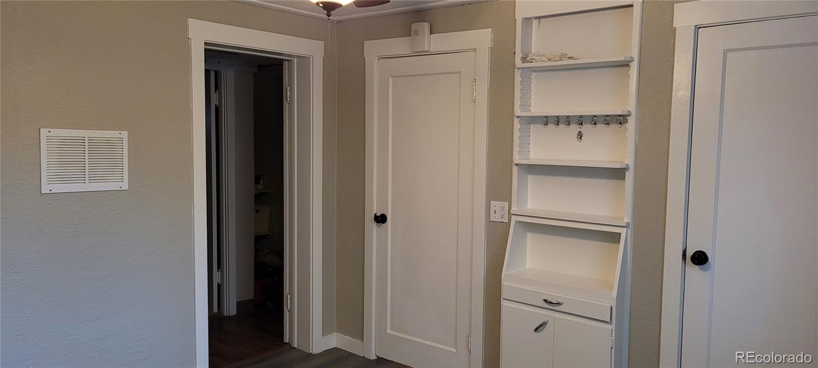 4737 Lowell Boulevard Denver, CO 80211 - Photo 28 of 28 a view of bathroom with a sink and mirror