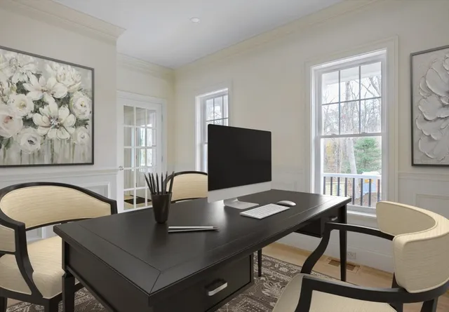 a view of a hallway with windows
