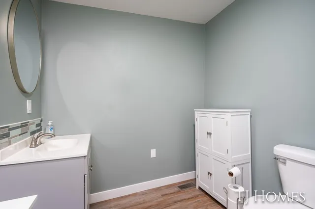 $309,900 | 6048 Stewart Woods Drive, Delton, MI 49046