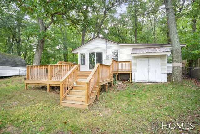 $309,900 | 6048 Stewart Woods Drive, Delton, MI 49046