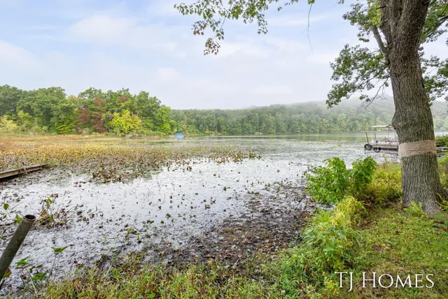 $309,900 | 6048 Stewart Woods Drive, Delton, MI 49046