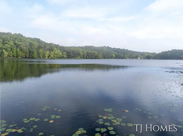 $309,900 | 6048 Stewart Woods Drive, Delton, MI 49046