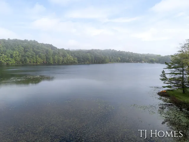 $309,900 | 6048 Stewart Woods Drive, Delton, MI 49046