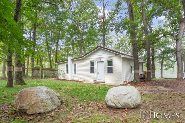 $309,900 | 6048 Stewart Woods Drive, Delton, MI 49046