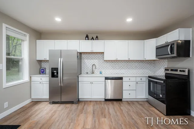 $309,900 | 6048 Stewart Woods Drive, Delton, MI 49046