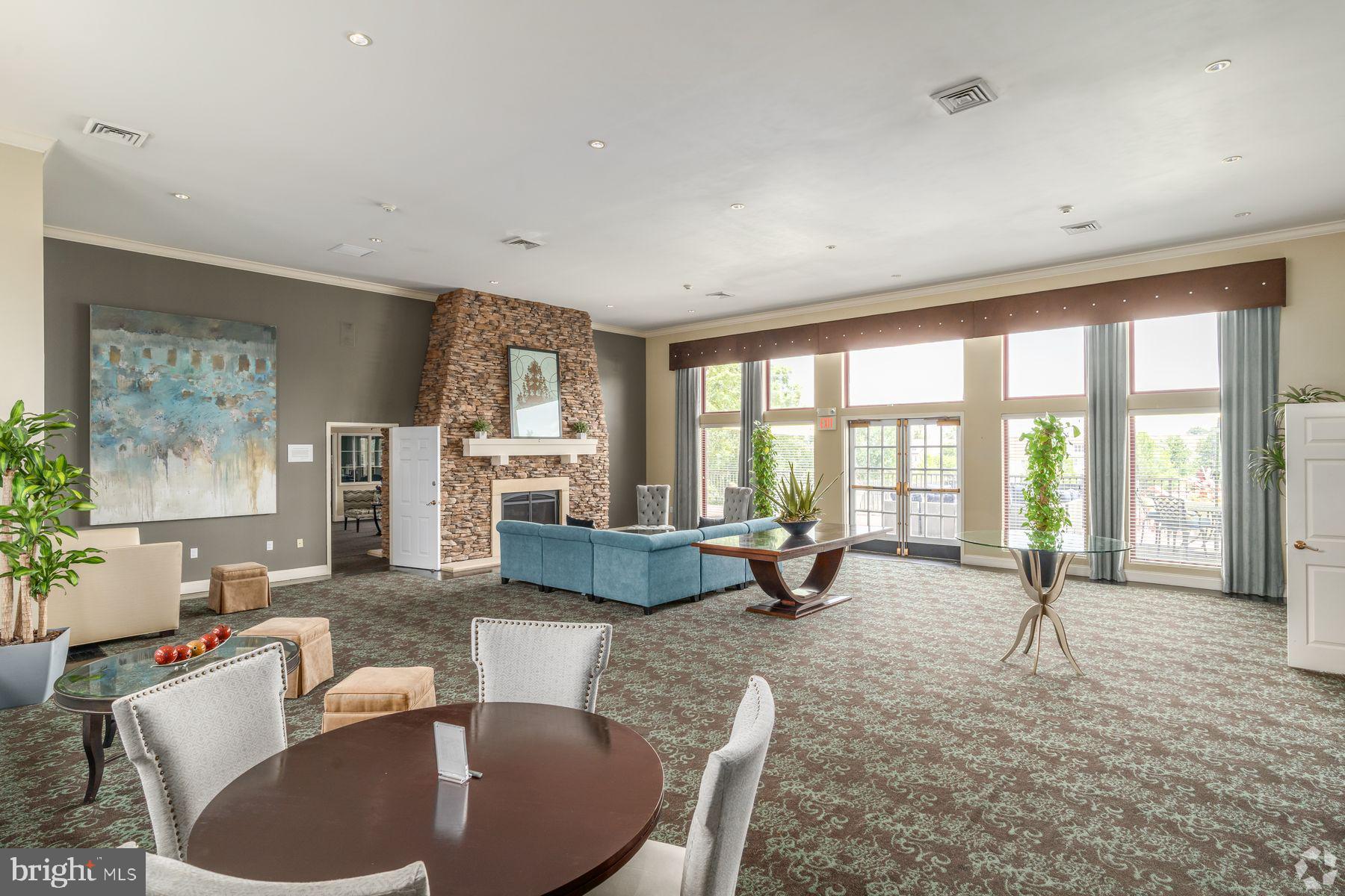 8440 Limekiln Pike, Unit STUDIO Wyncote, PA 19095 - Photo 5 of 11 a living room with furniture and a large window