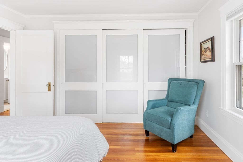 62 Grant Street Needham, MA 02492 - Photo 11 of 24 a bedroom with a bed and a couch