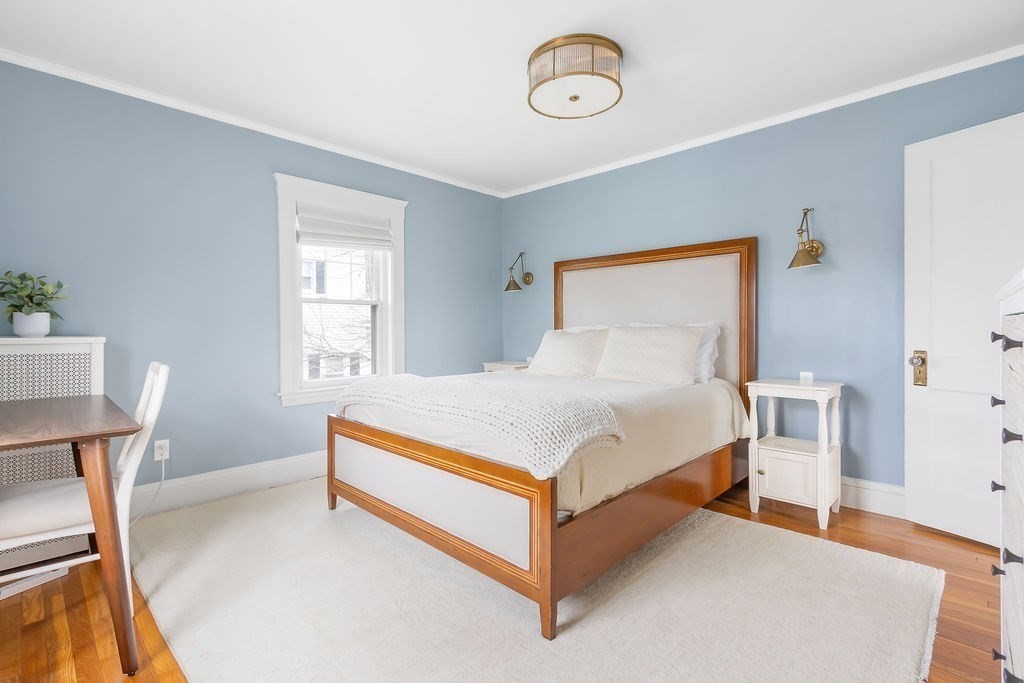 62 Grant Street Needham, MA 02492 - Photo 12 of 24 a bed sitting in a bedroom next to a window
