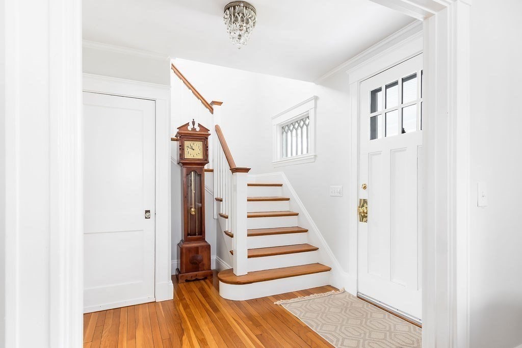 62 Grant Street Needham, MA 02492 - Photo 9 of 24 a view of a hallway with staircase