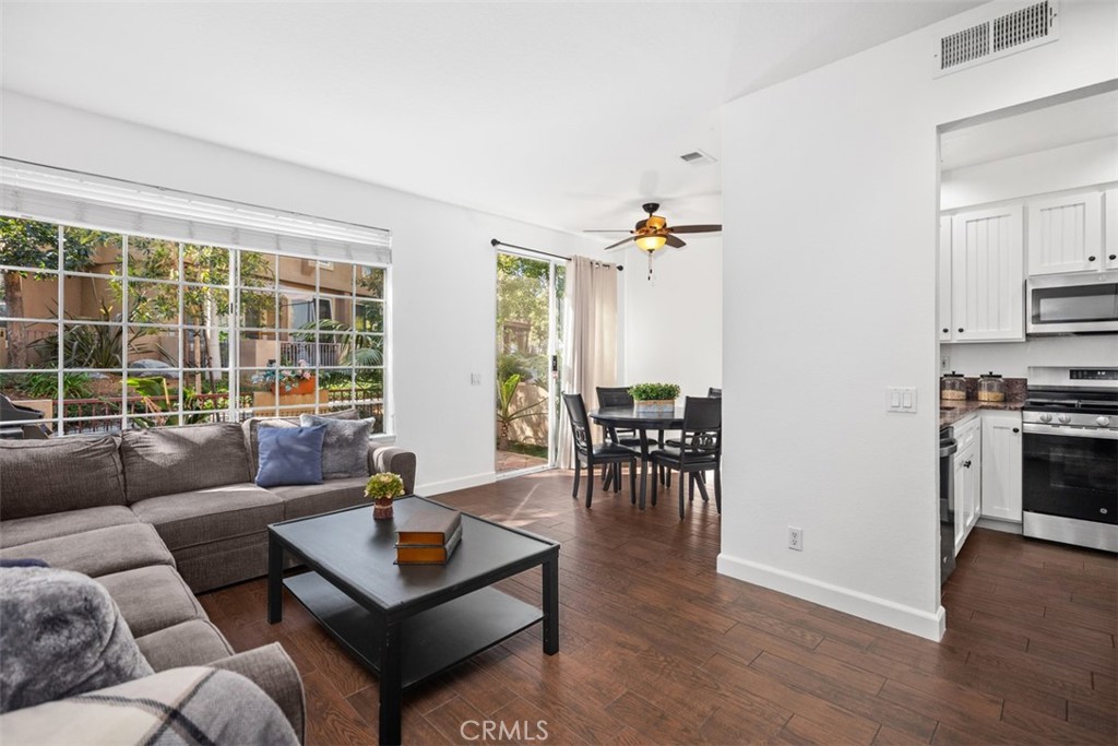 288 Pasto Rico Rancho Santa Margarita, CA 92688 - Photo 7 of 29 Living Room Opens to Kichen and Dining Area