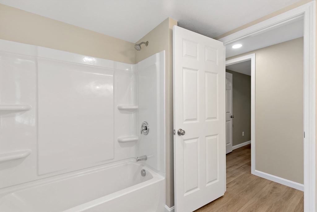 2 Womponoag Road Plymouth, MA 02360 - Photo 20 of 24 a bathroom with a bathtub and a shower
