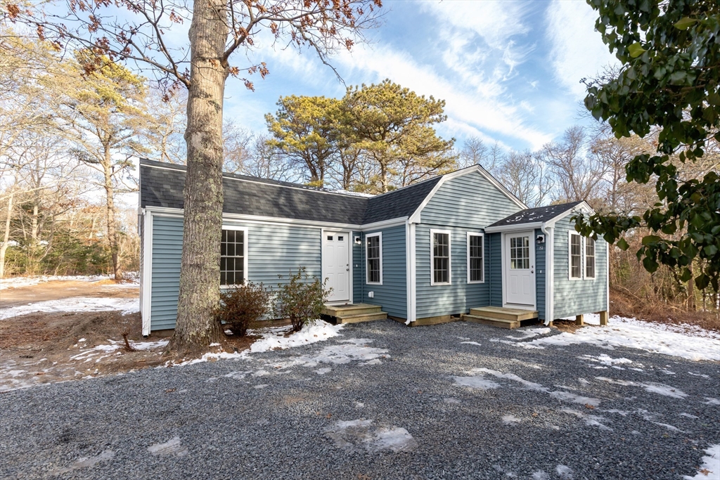 2 Womponoag Road Plymouth, MA 02360 - Photo 2 of 24 a front view of a house with garden