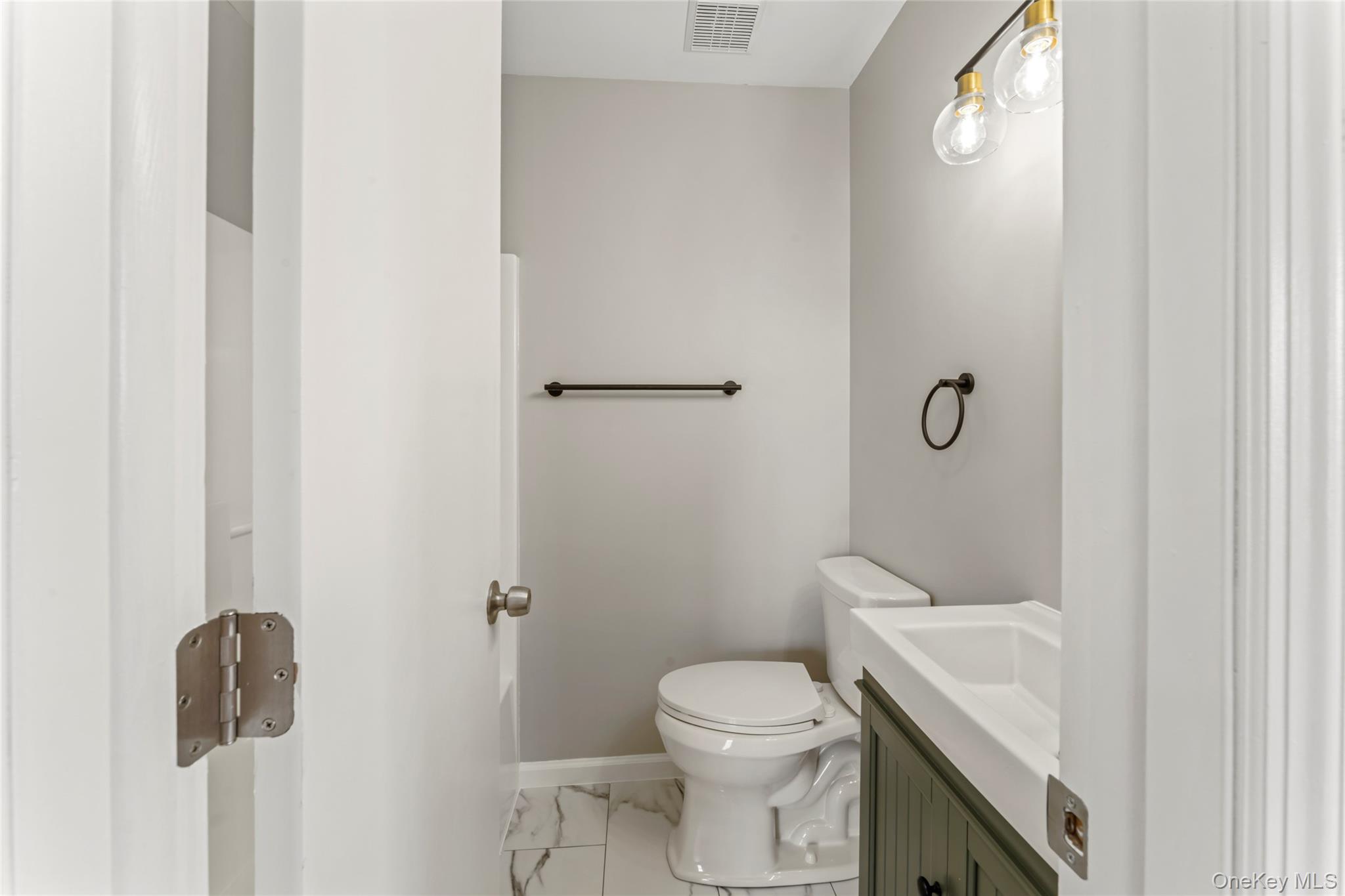99 Evan Road Warwick, NY 10990 - Photo 20 of 27 a bathroom with a toilet and a shower