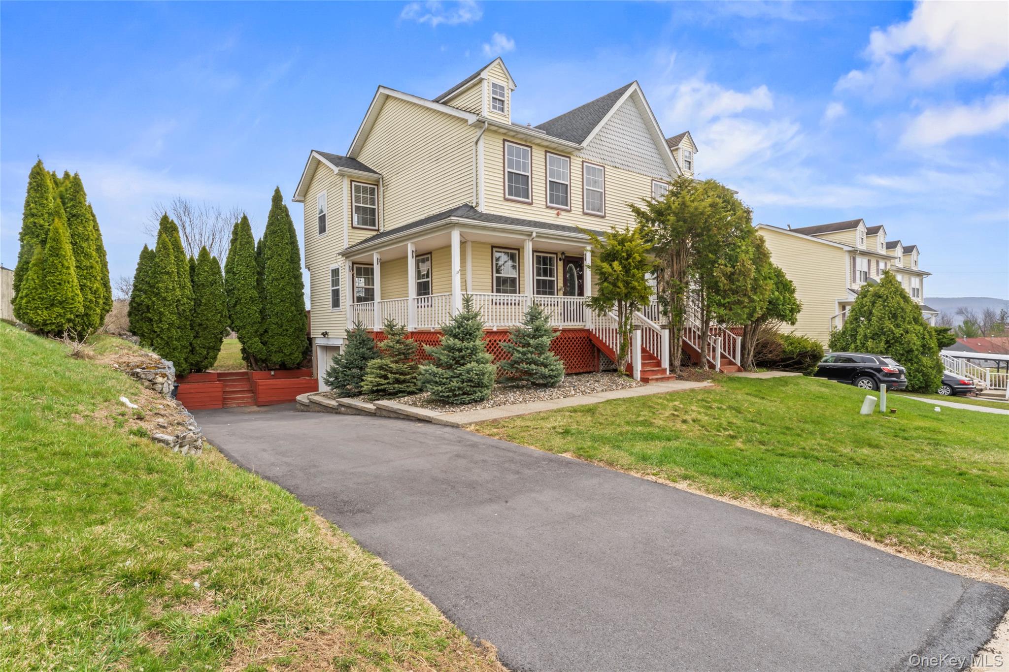99 Evan Road Warwick, NY 10990 - Photo 2 of 27 a front view of a house with garden