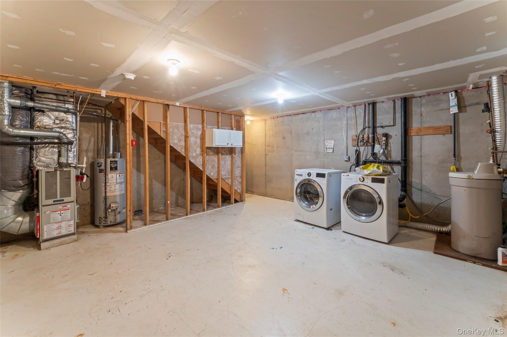 99 Evan Road Warwick, NY 10990 - Photo 23 of 27 a view of a storage & utility room with washer and dryer