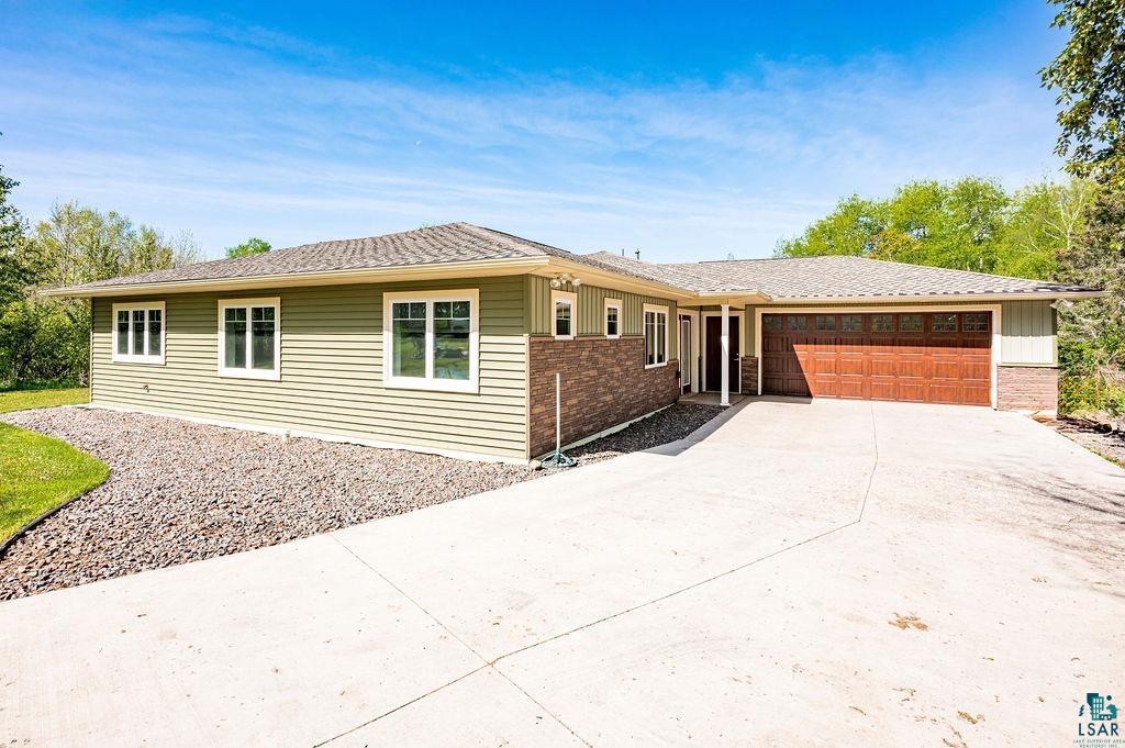 3825 Kenroy Road Hermantown, MN 55811 - Photo 1 of 28 Ranch-style house featuring a garage