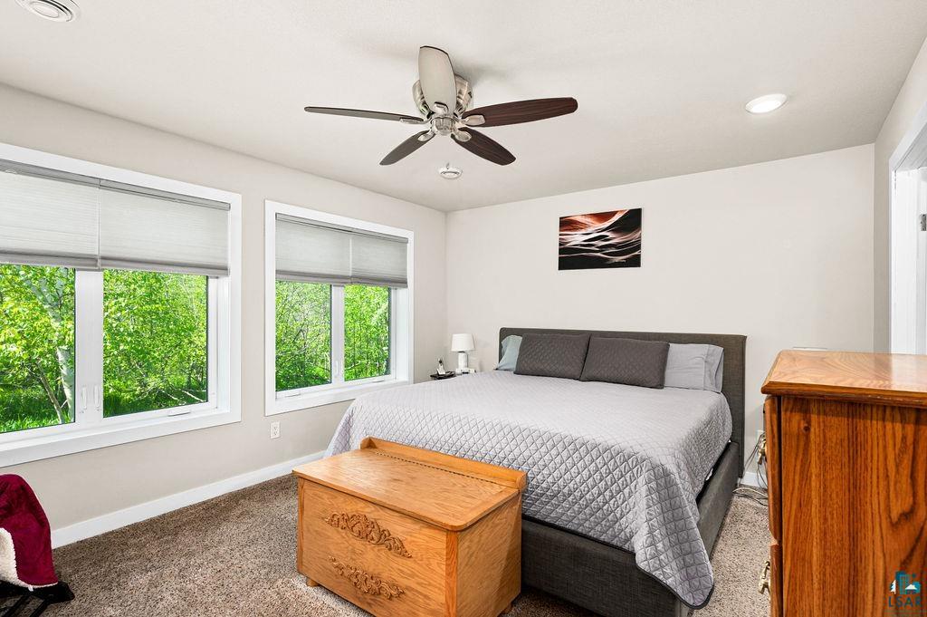 3825 Kenroy Road Hermantown, MN 55811 - Photo 12 of 28 Bedroom with carpet flooring and ceiling fan