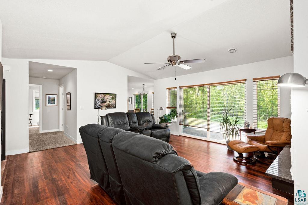 3825 Kenroy Road Hermantown, MN 55811 - Photo 17 of 28 Living room featuring wood-type flooring, ceiling fan, and lofted ceiling