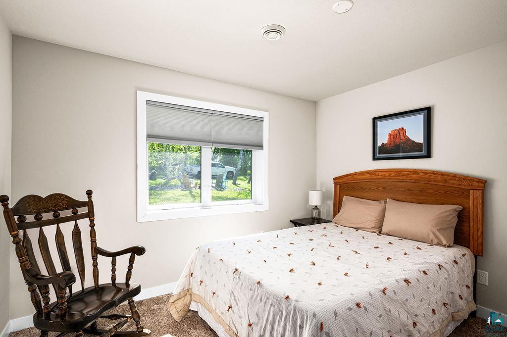 3825 Kenroy Road Hermantown, MN 55811 - Photo 18 of 28 View of carpeted bedroom