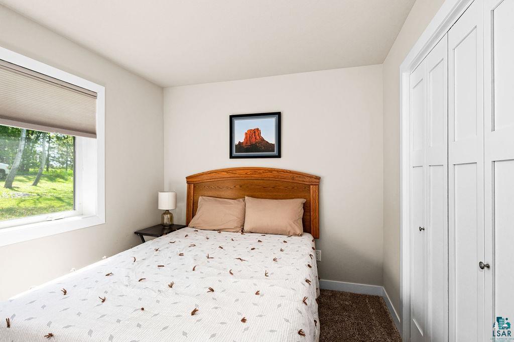 3825 Kenroy Road Hermantown, MN 55811 - Photo 19 of 28 Carpeted bedroom with a closet