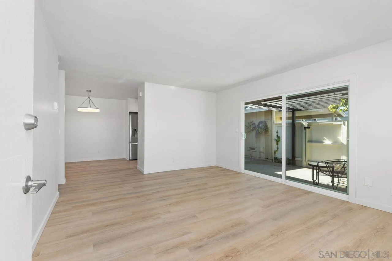 285 Aspenwood Lane Encinitas, CA 92024 - Photo 27 of 39 a view of a room with wooden floor and a bathroom