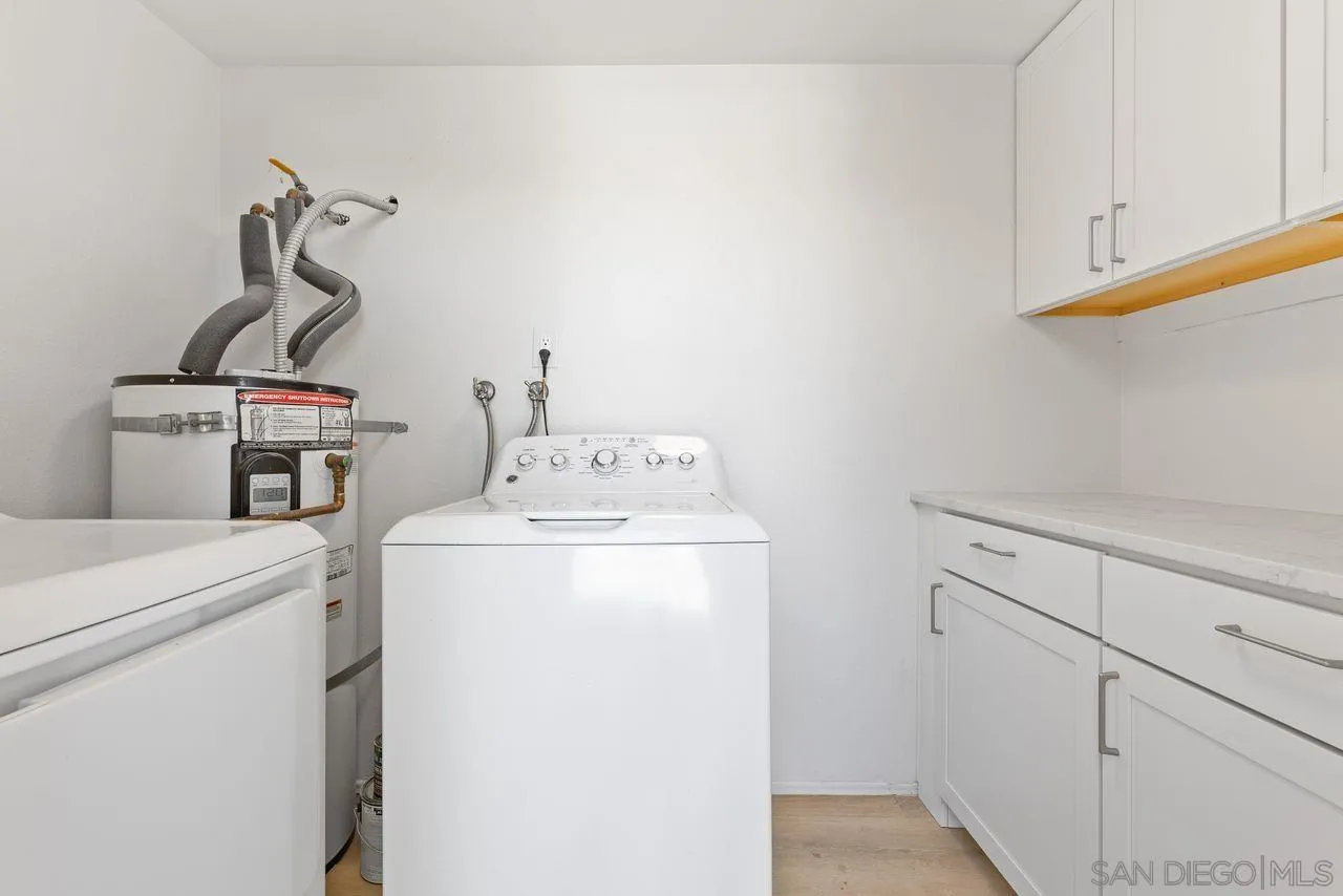 285 Aspenwood Lane Encinitas, CA 92024 - Photo 36 of 39 a utility room with dryer and washer
