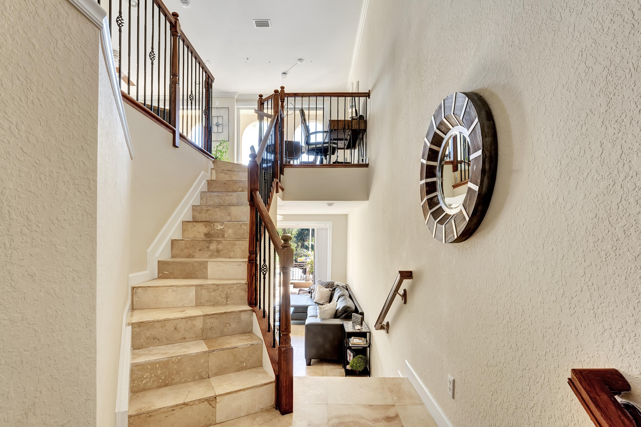3061 Waterside Circle Boynton Beach, FL 33435 - Photo 11 of 39 a view of entryway and hall with wooden floor
