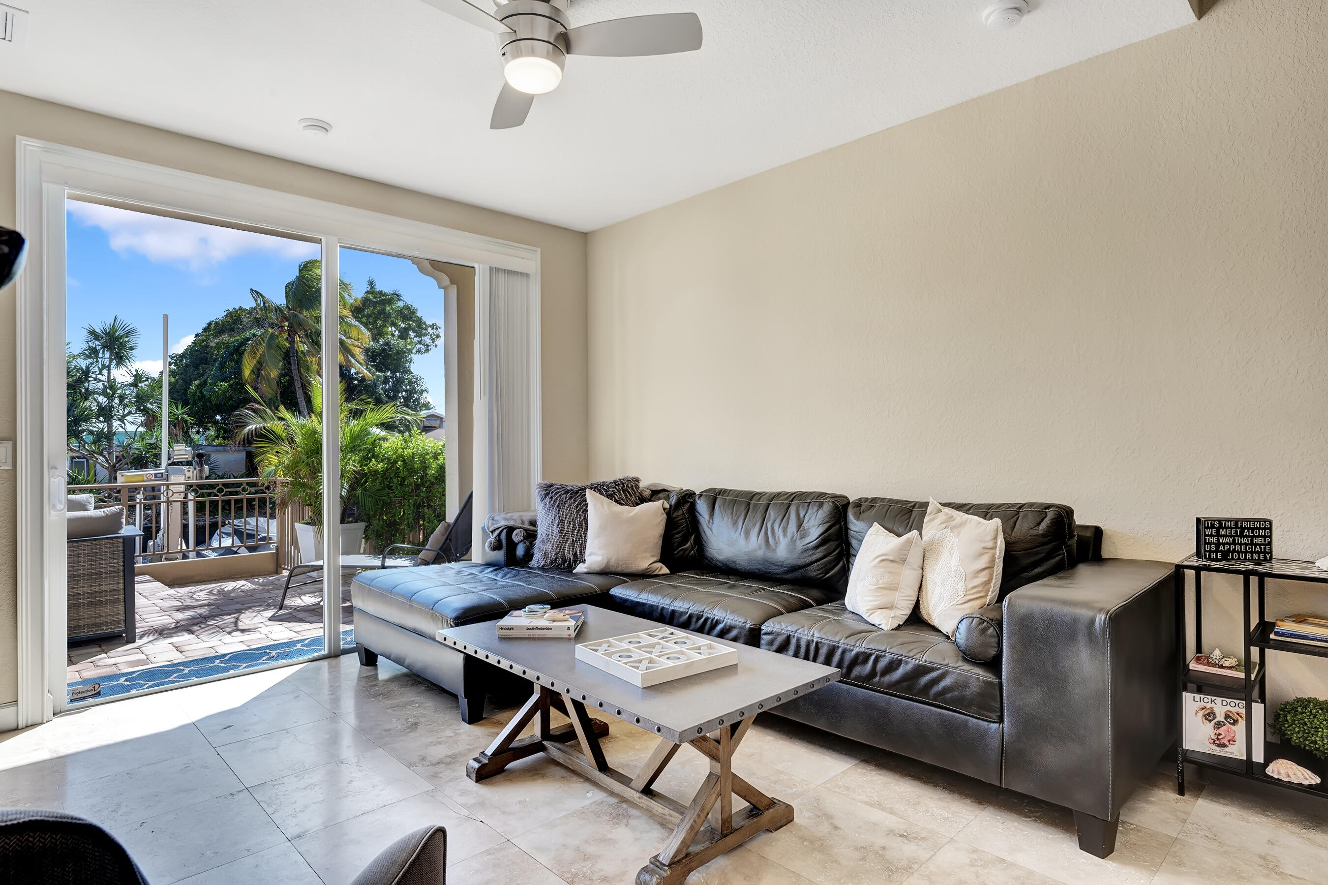 3061 Waterside Circle Boynton Beach, FL 33435 - Photo 13 of 39 a living room with furniture and a large window