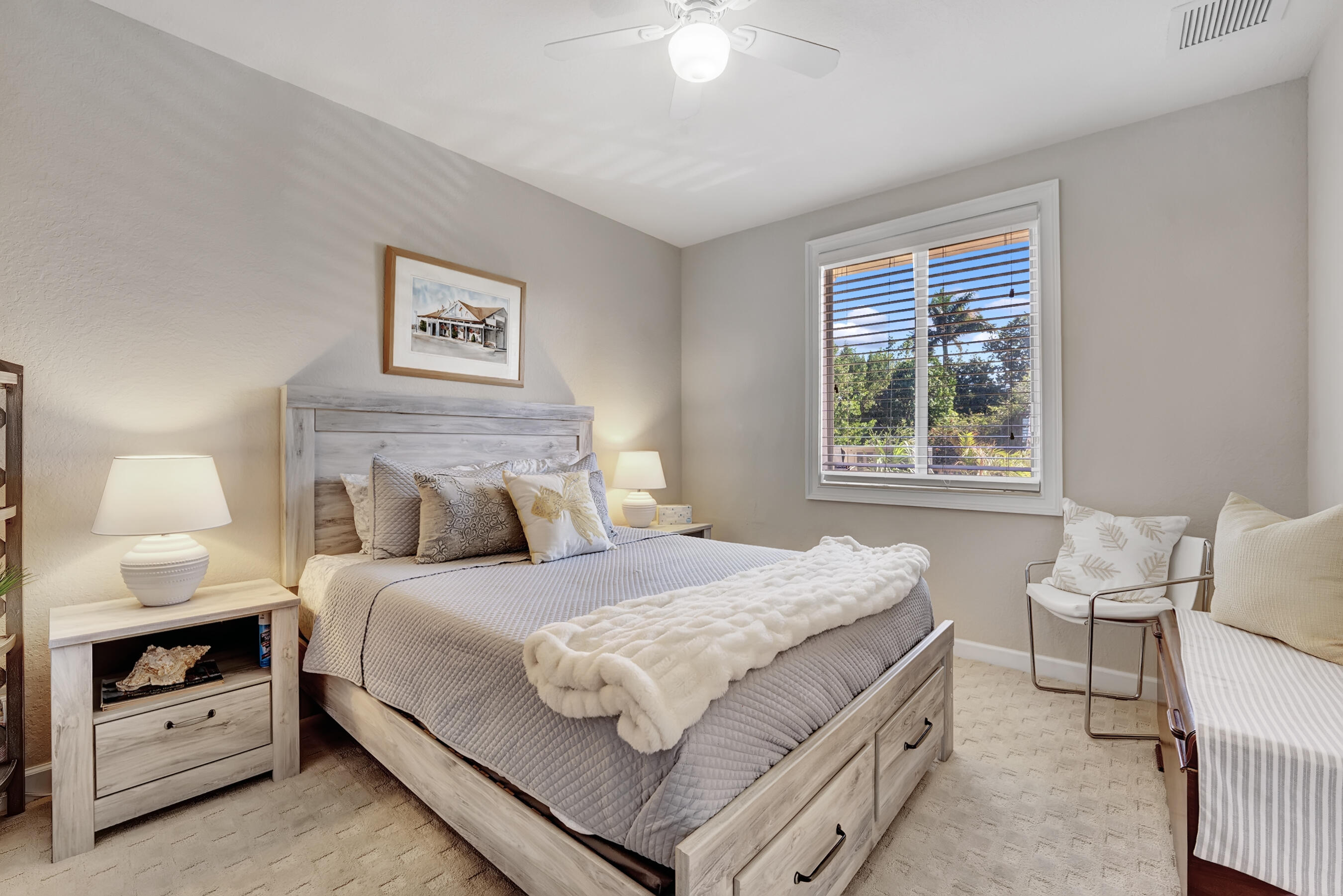 3061 Waterside Circle Boynton Beach, FL 33435 - Photo 14 of 39 a bedroom with a bed and a lamp on dresser