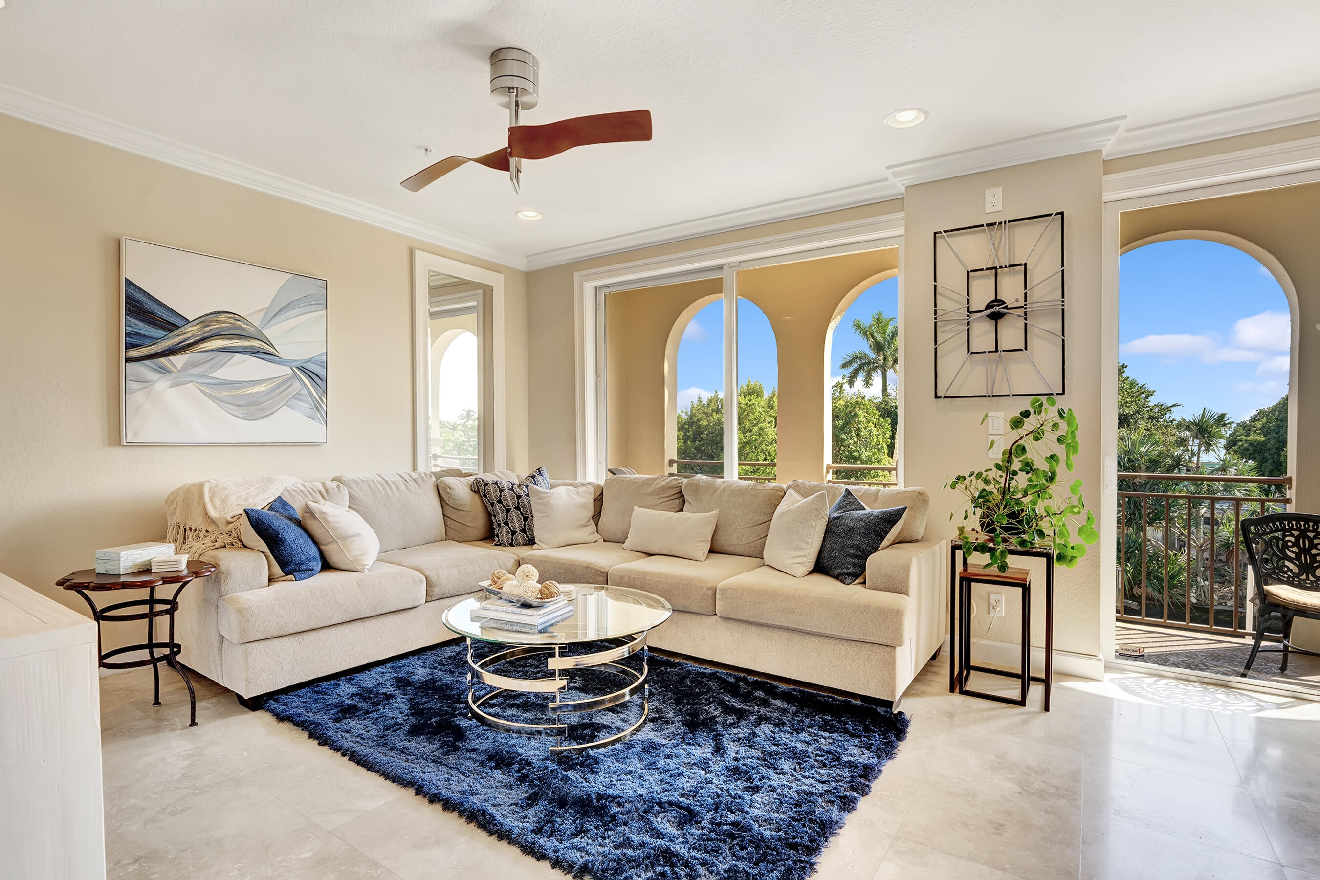 3061 Waterside Circle Boynton Beach, FL 33435 - Photo 16 of 39 a living room with furniture fireplace and a large window