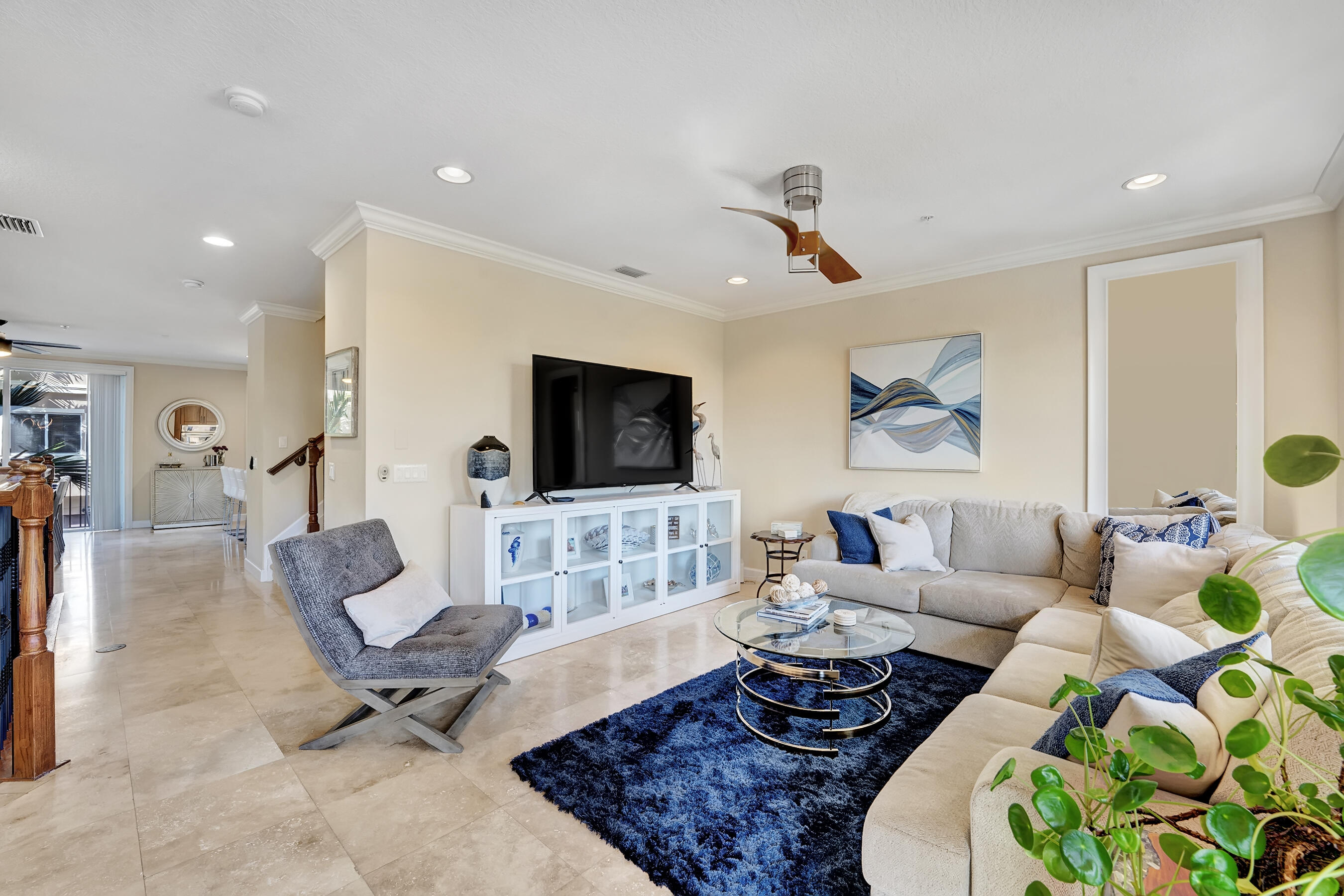 3061 Waterside Circle Boynton Beach, FL 33435 - Photo 20 of 39 a living room with furniture and a flat screen tv
