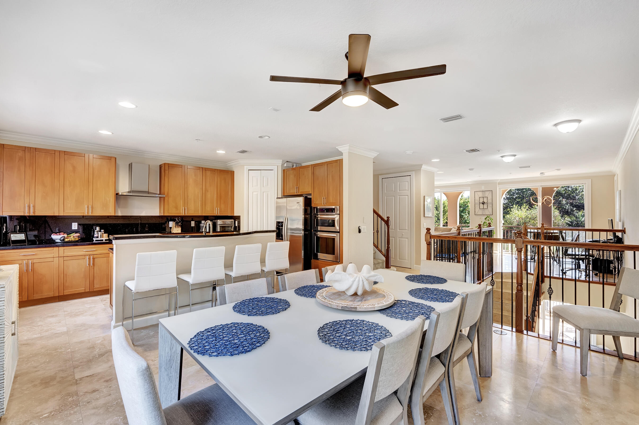3061 Waterside Circle Boynton Beach, FL 33435 - Photo 21 of 39 a view of a dining room with furniture