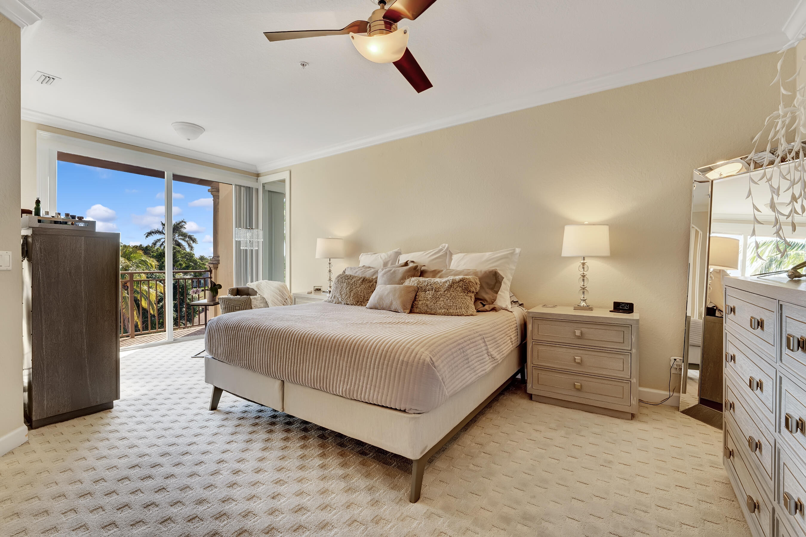 3061 Waterside Circle Boynton Beach, FL 33435 - Photo 31 of 39 a bedroom with a bed and dresser