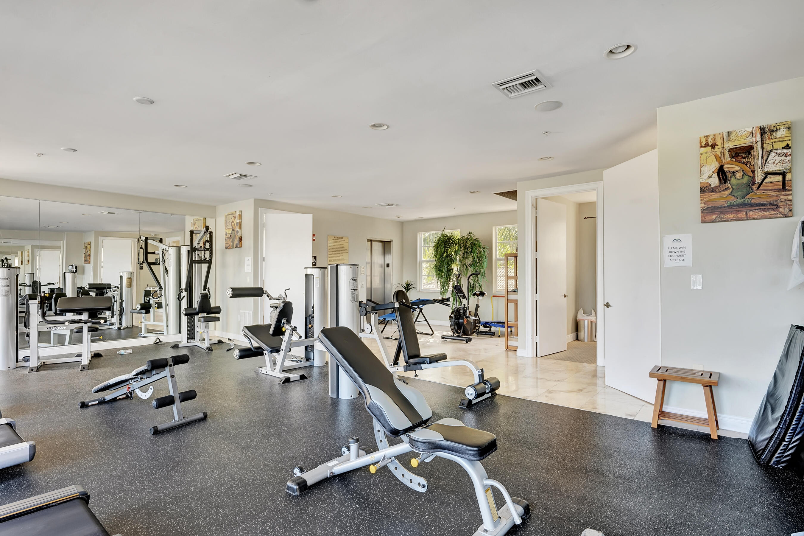 3061 Waterside Circle Boynton Beach, FL 33435 - Photo 39 of 39 a view of a room with gym equipment