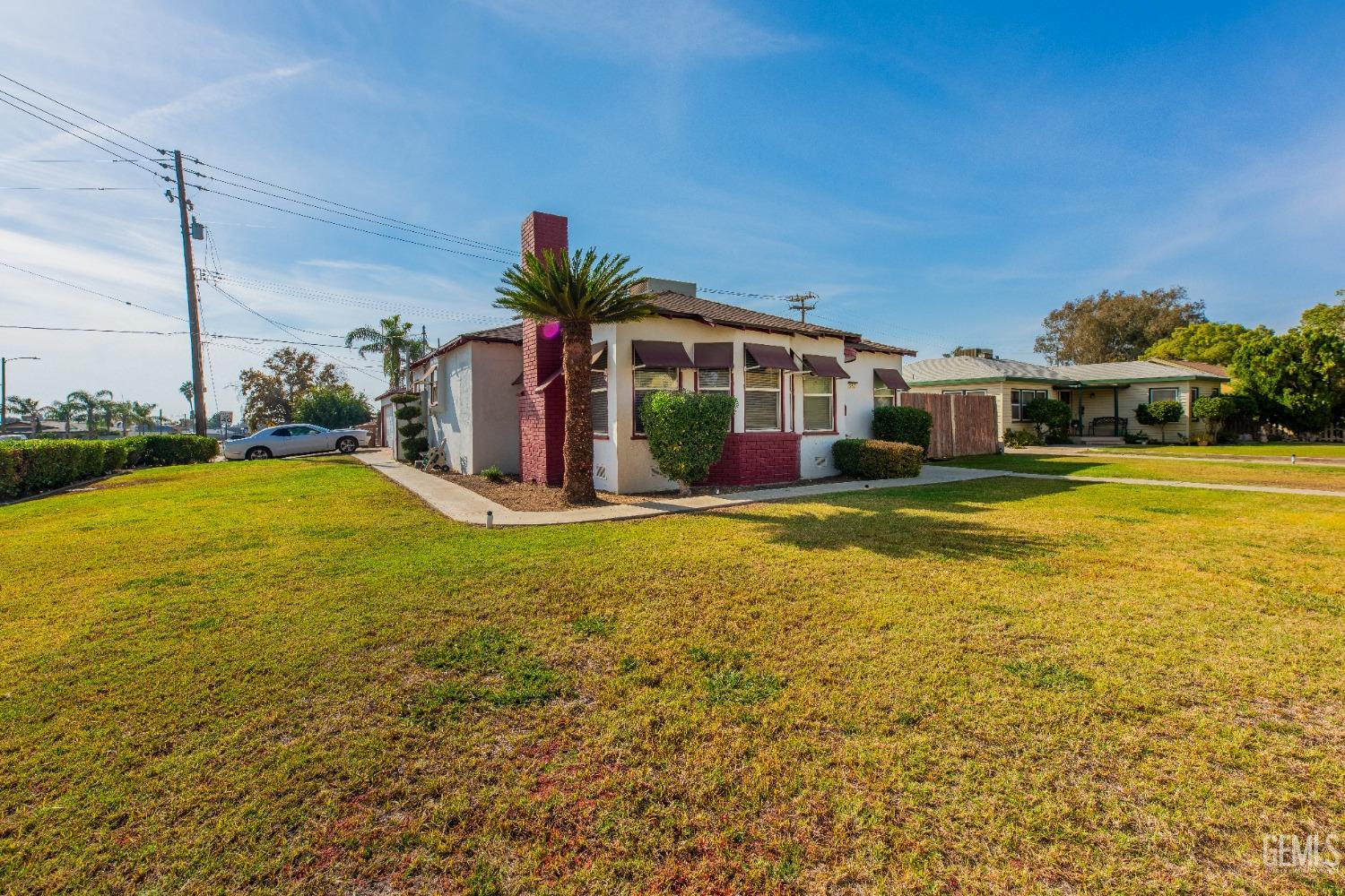 Undisclosed Address Bakersfield, CA 93305 - Photo 2 of 27 a view of a house with a swimming pool