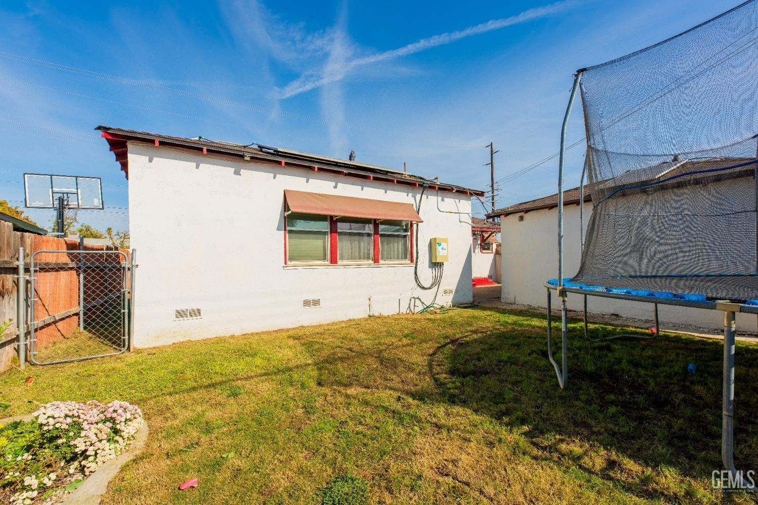 Undisclosed Address Bakersfield, CA 93305 - Photo 26 of 27 a house view with a backyard space